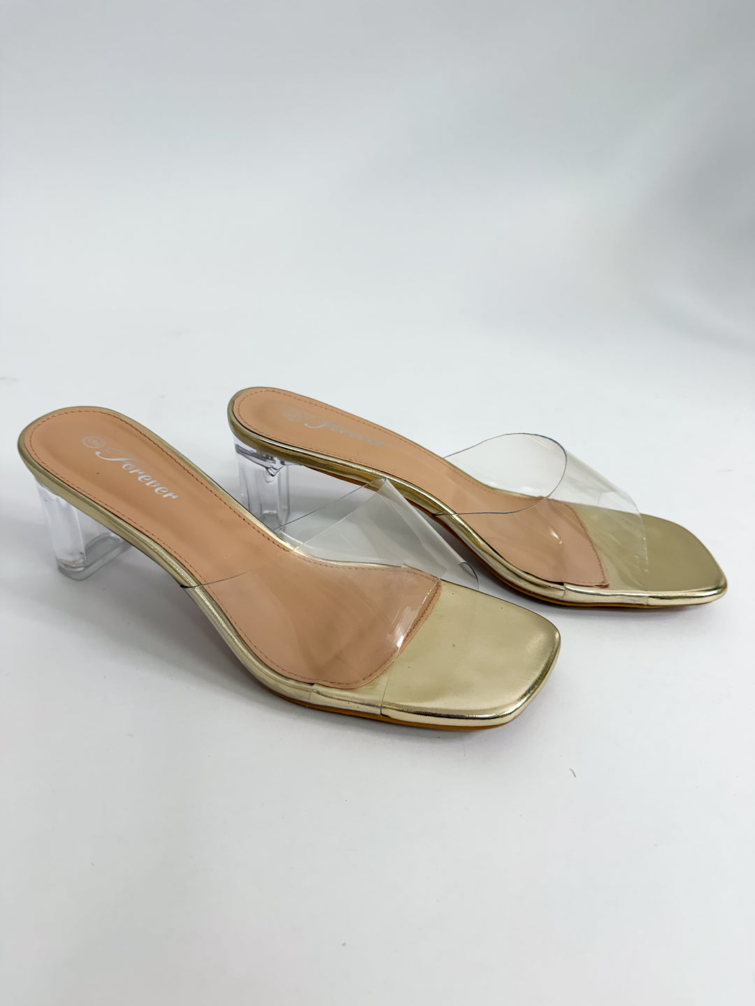 Dignified Clear Gold Heels
