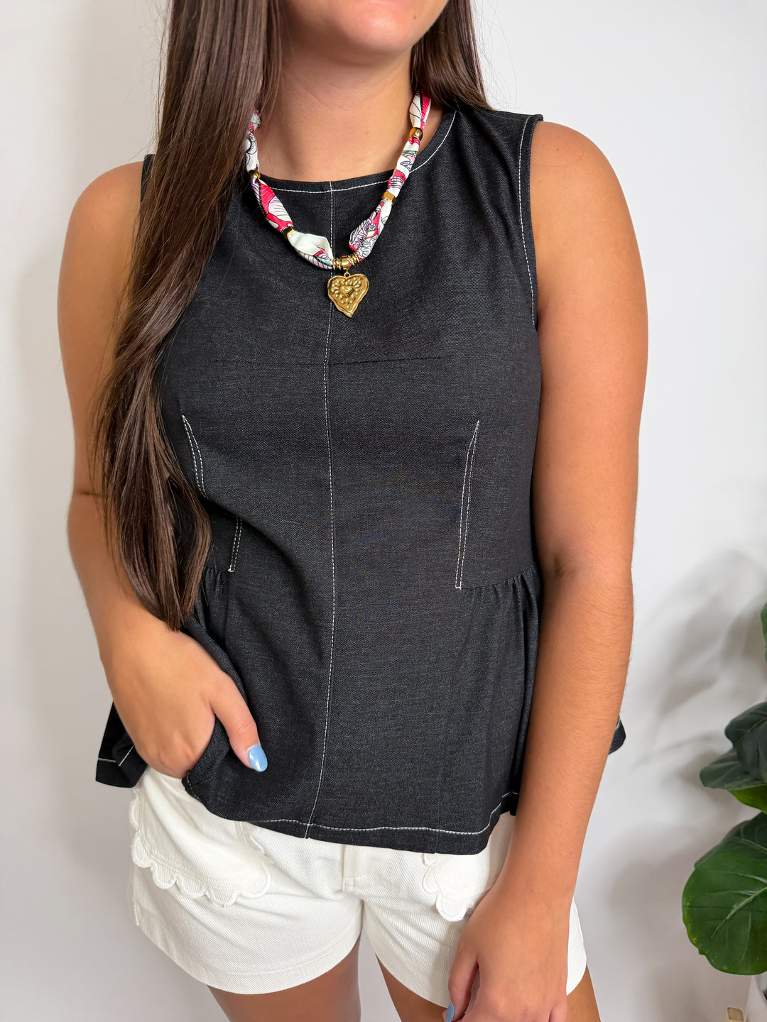 Sleeveless Peplum Top