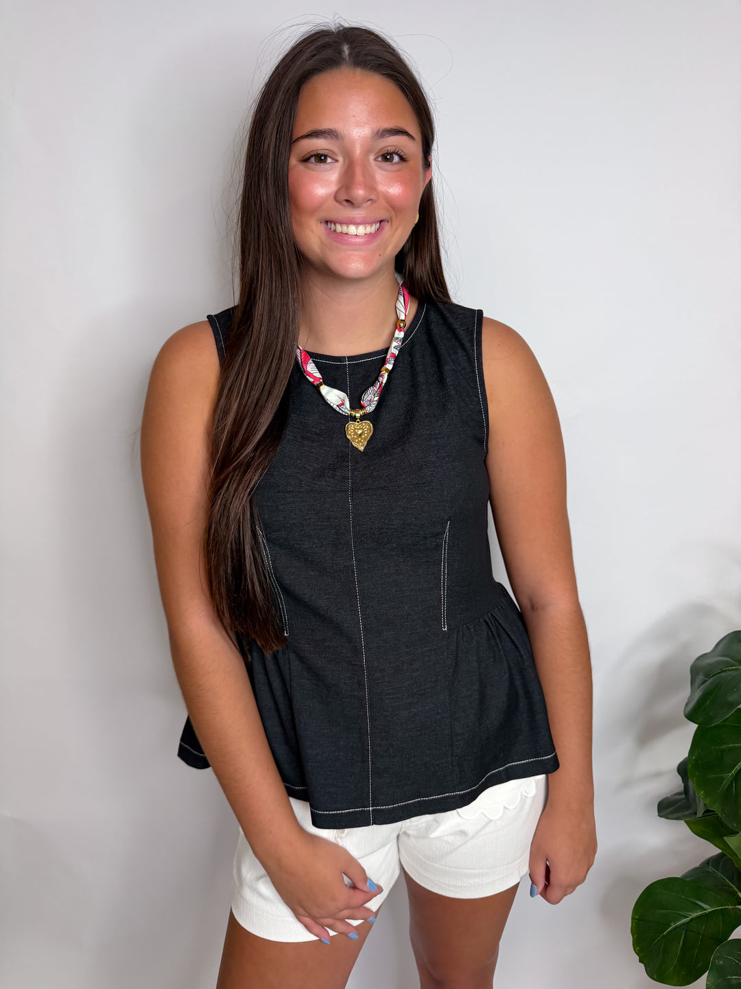 Sleeveless Peplum Top