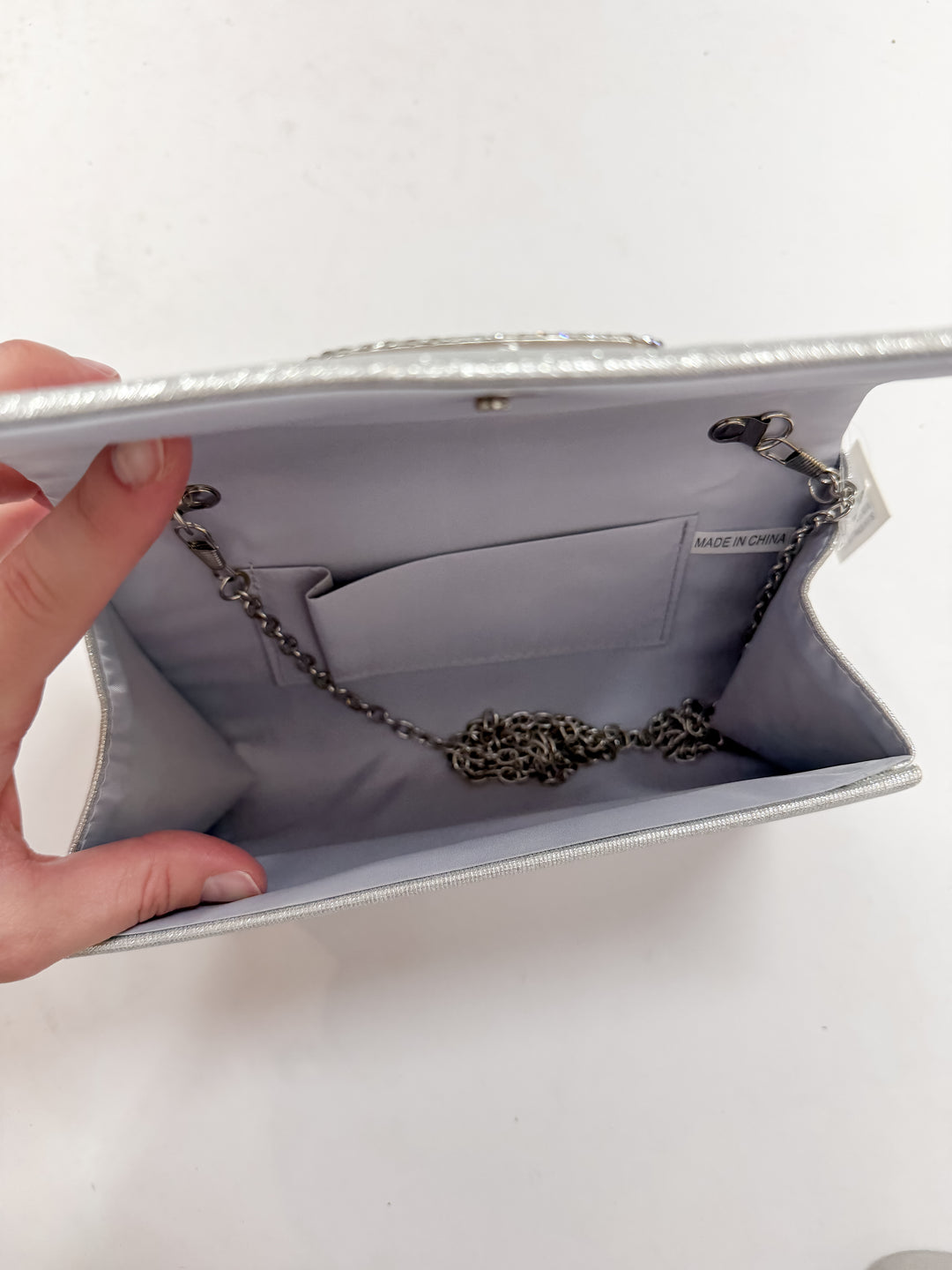 Silver Soiree Crystal Buckle Clutch
